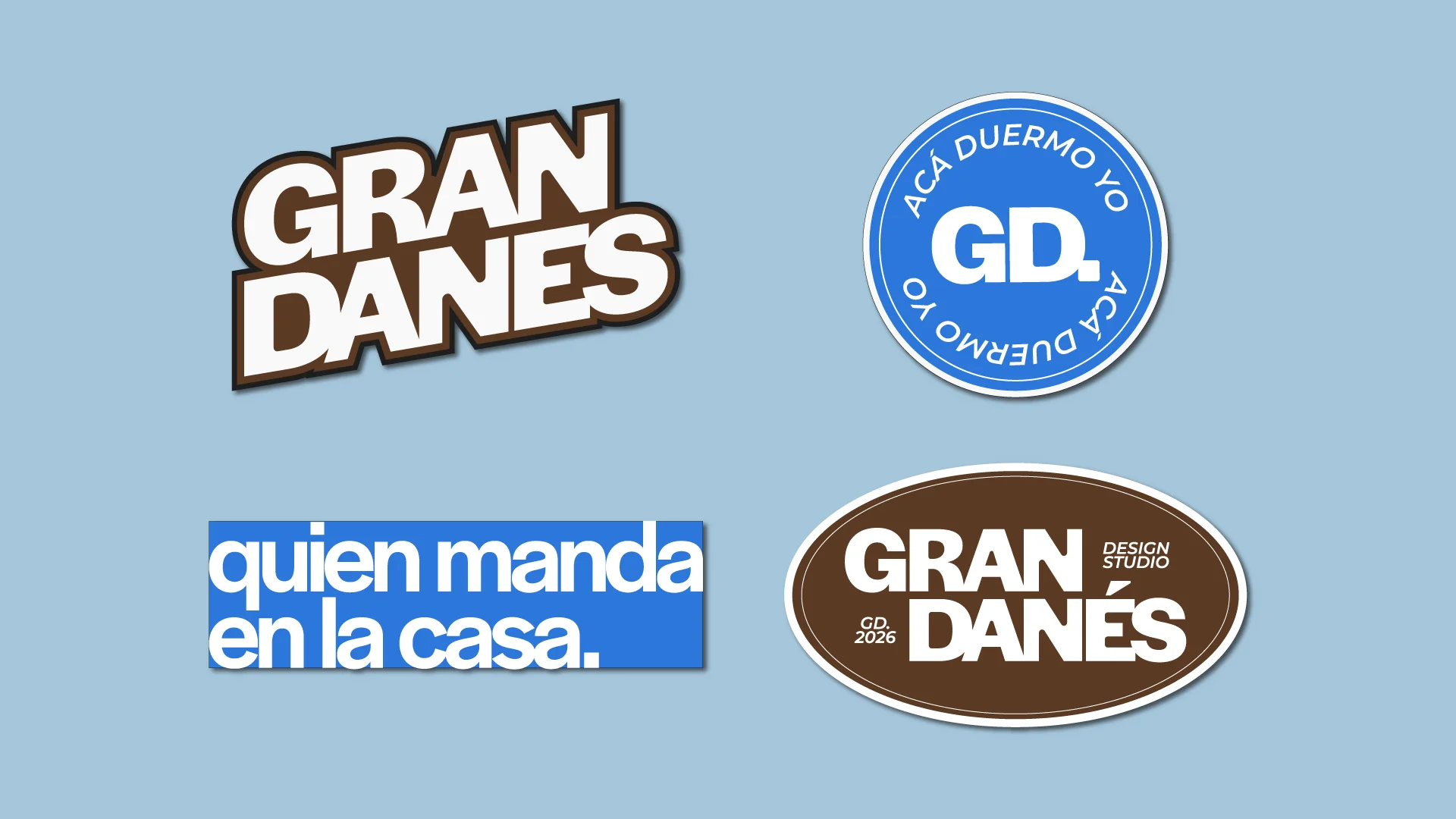 Grandanés stickers on light blue: the stacked wordmark, the round GD “Acá duermo yo” seal, the “quien manda en la casa” label and the oval logo.
