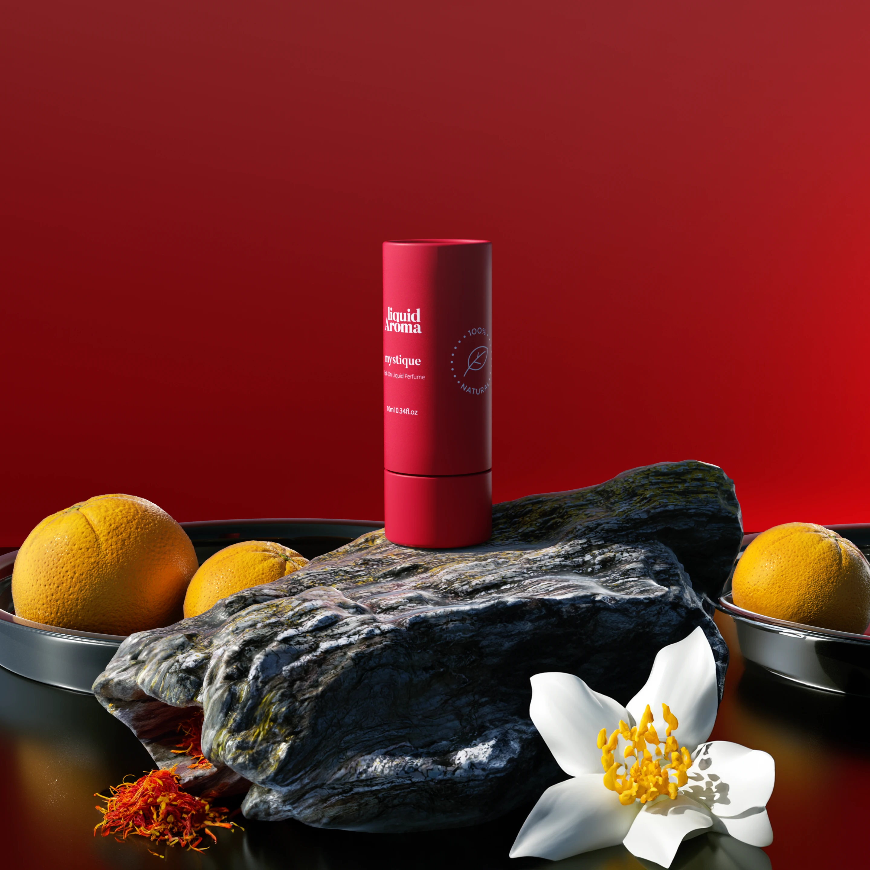 The red Mystique tube on a dark stone with oranges, saffron and a white blossom, against red.