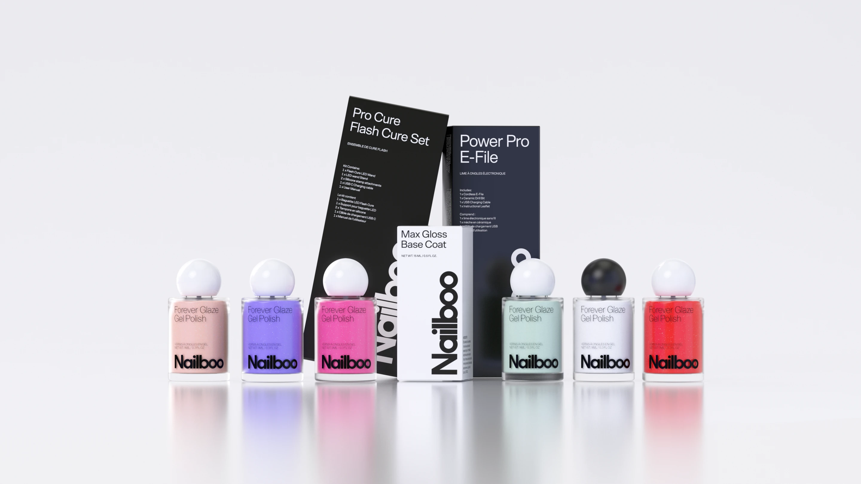 Seven Nailboo gel polish bottles in front of the Max Gloss Base Coat, Pro Cure Flash Cure Set and Power Pro E-File boxes, on white.